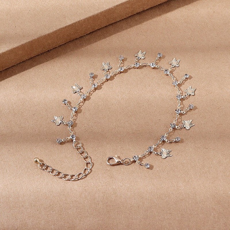 Silver-tone perlevida flower and butterfly charm anklet