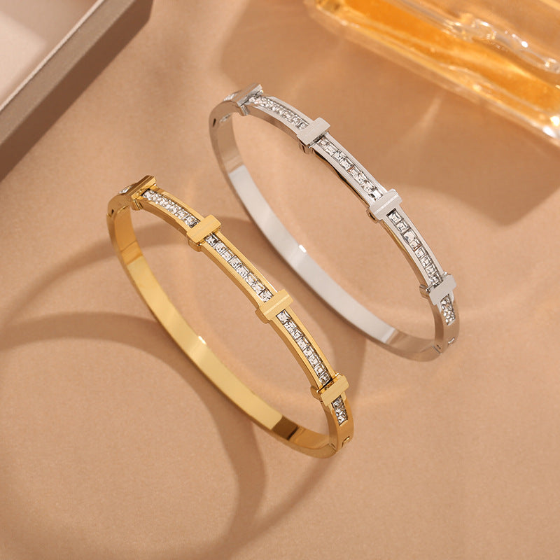 Perlevida gold-tone geometric rhinestone open bangle bracelet